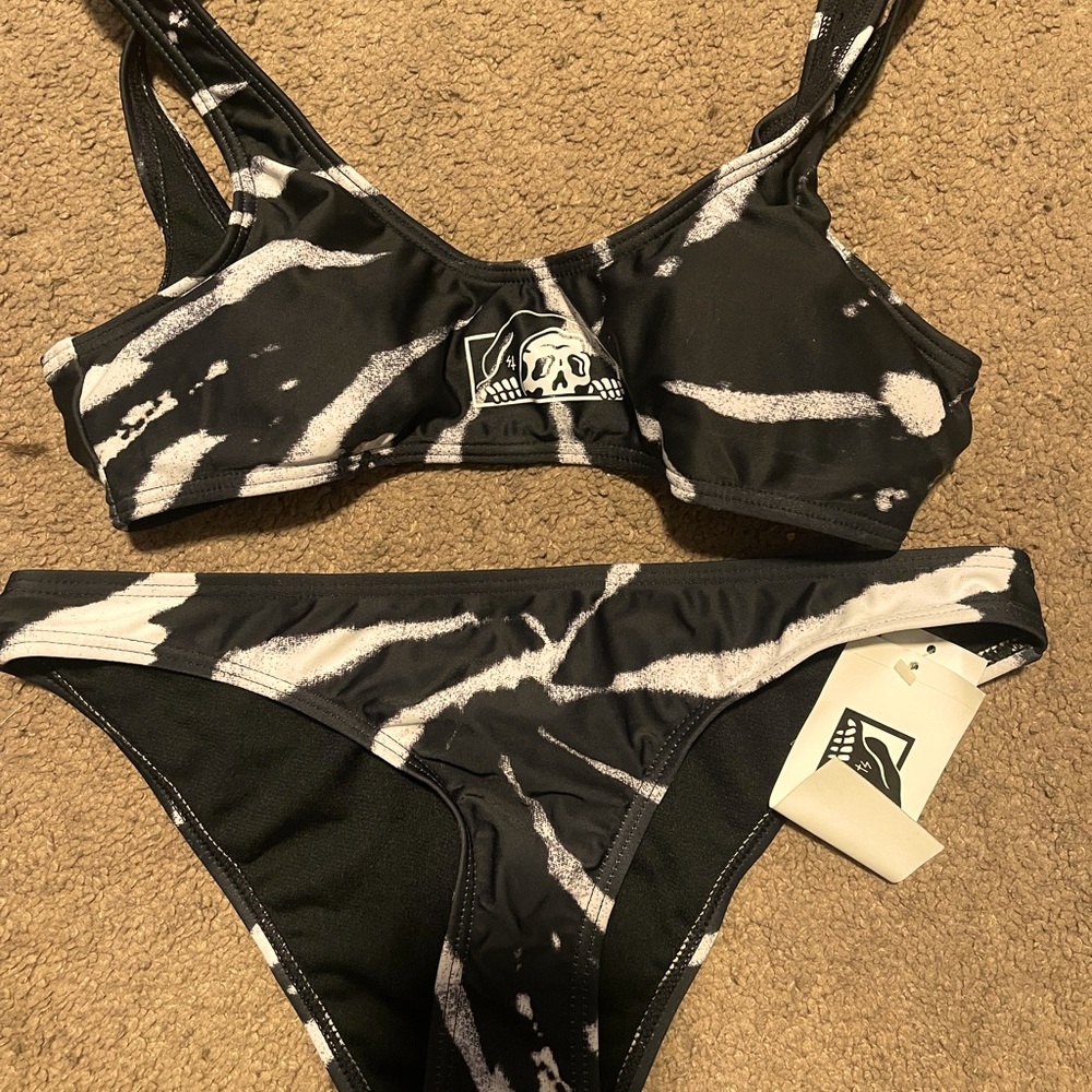Brand new. Swimsuit
